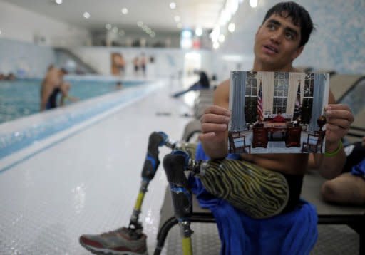 Afghan amputee Malek Mohammad during an interview after training at a Kabul wimming pool. Malek is one of tens of thousands of Afghan amputees, victims of three decades of war that have made Afghanistan one of the most heavily mined countries in the world