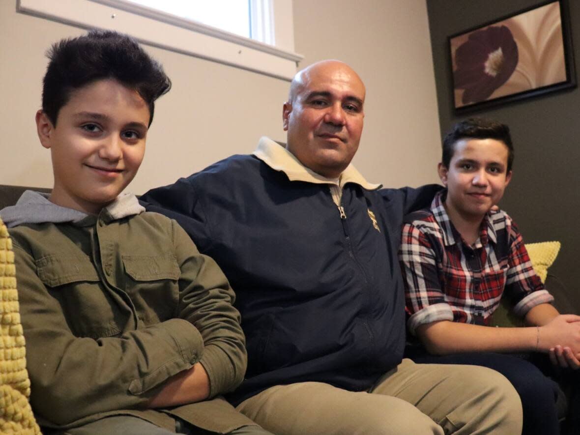 The Sedi family arrived to Canada in July 2021 after multiple interviews and medical examines. Salahaldeen Sedi, left, Zakareia Sedi, middle, Hassan Sedi, right, say the pandemic delayed their arrival.  (Jennifer La Grassa/CBC - image credit)