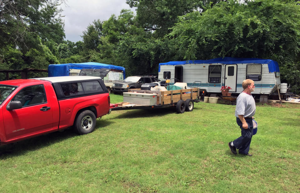 John Welch, 51, spent Wednesday loading up valuables. He plans to evacuate before the Brazos River is predicted to crest on Thursday. (Yahoo News/Jason Sickles)