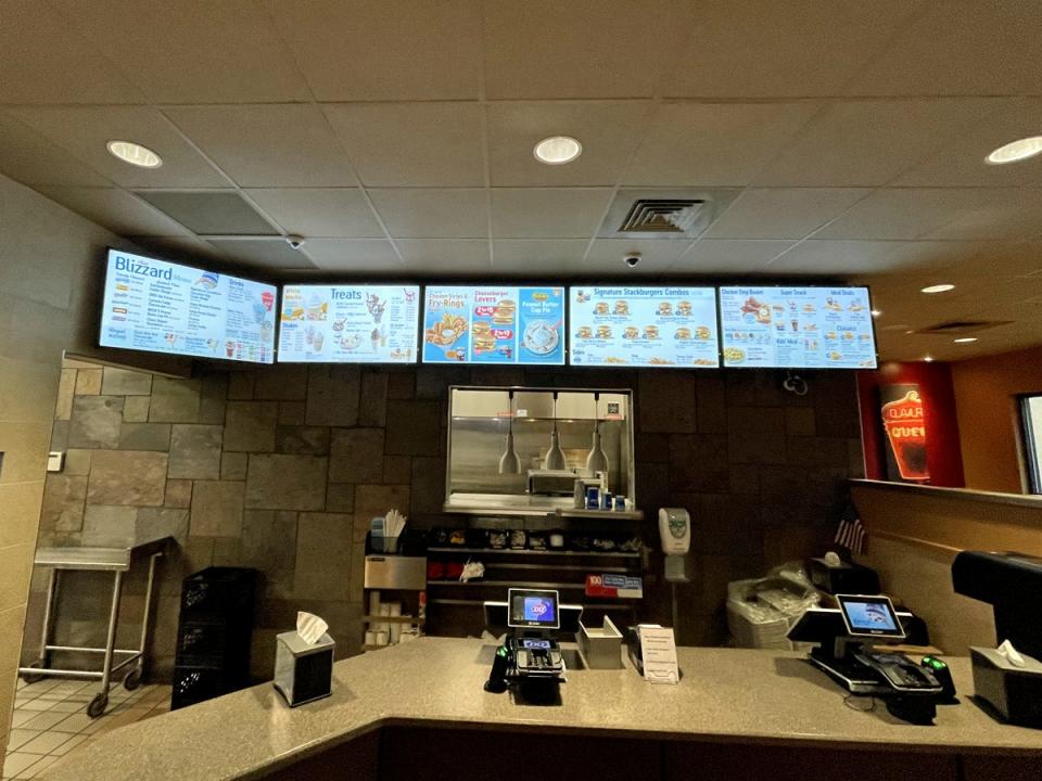 The cash register and menu at Dairy Queen.