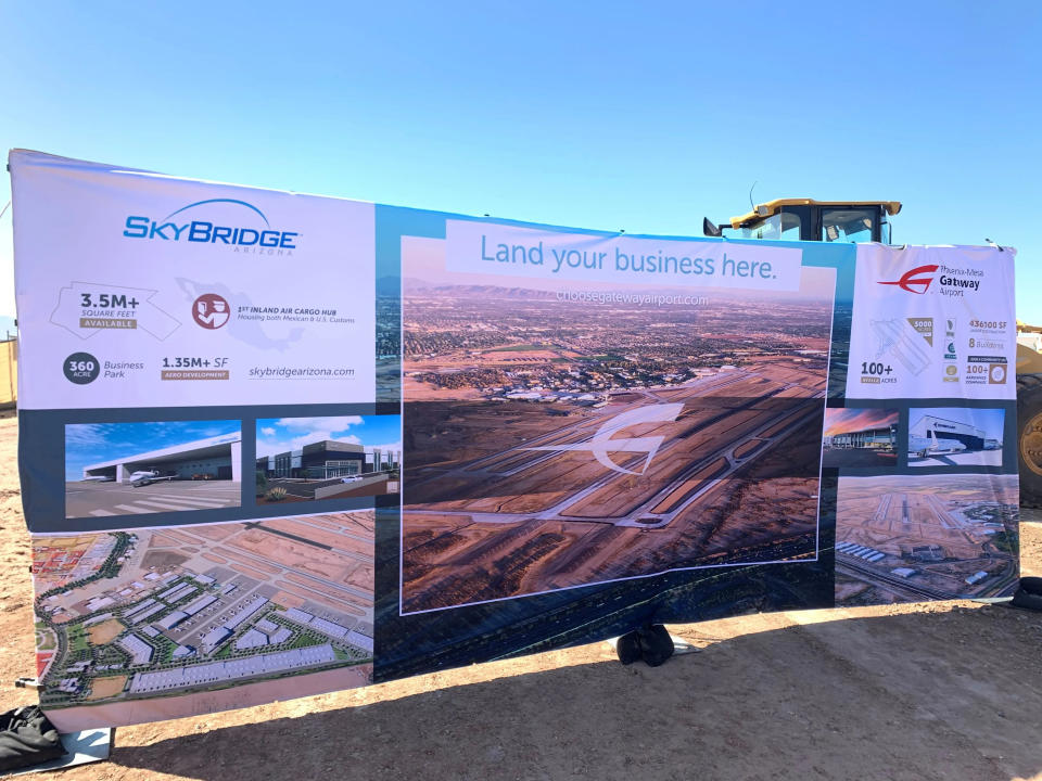 A poster of SkyBridge's planned developments on display at the groundbreaking ceremony.