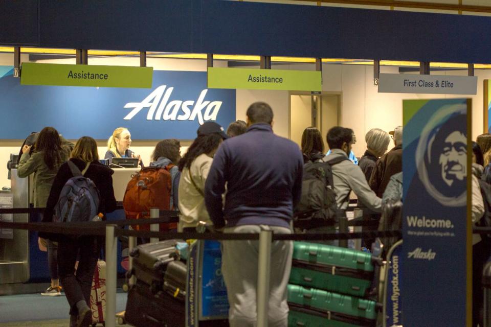 <p>Getty</p> Alaska Airlines check-in counter at Portland International Airport. 