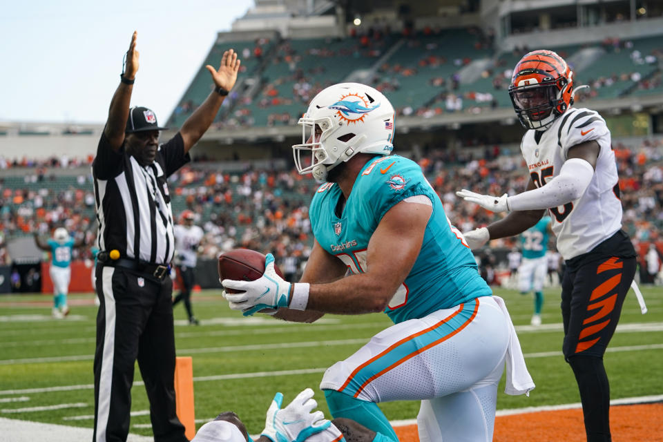 Miami Dolphins tight end Chris Myarick (85) reacts after a catch for a touchdown against the Cincinnati Bengals in the second half of an NFL exhibition football game in Cincinnati, Sunday, Aug. 29, 2021. (AP Photo/Bryan Woolston)