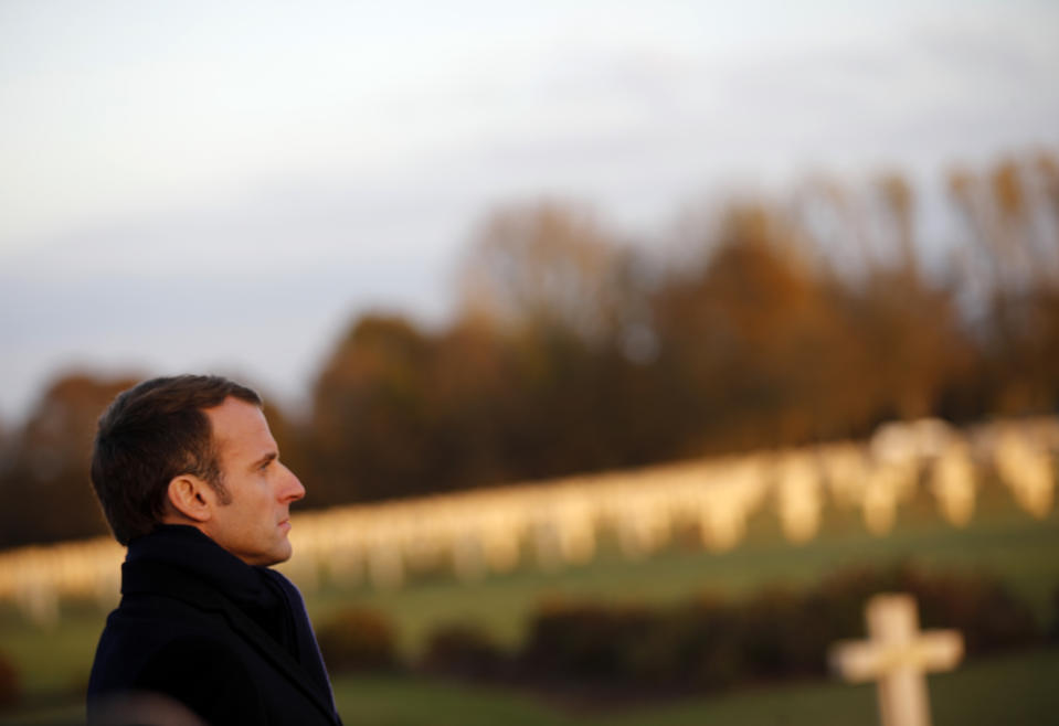 French President Emmanuel Macron looks on at the Notre Dame de Lorette war cemetery near Arras, northern France, Thursday, Nov.8, 2018 as part of ceremonies marking the 100th anniversary of the end of WWI. (AP Photo/Francois Mori, Pool)