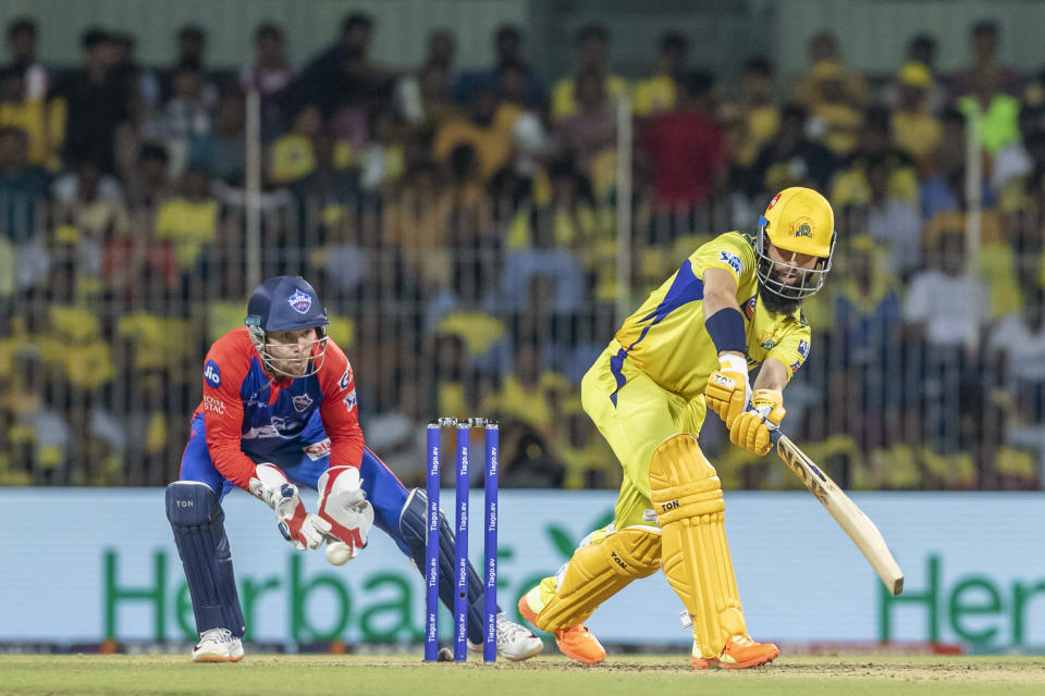 Chennai Super Kings' Moeen Ali plays a shot during the Indian Premier League cricket match between Delhi Capitals and Chennai Super Kings in Chennai, India, Wednesday, May 10, 2023. (AP Photo /R. Parthibhan)