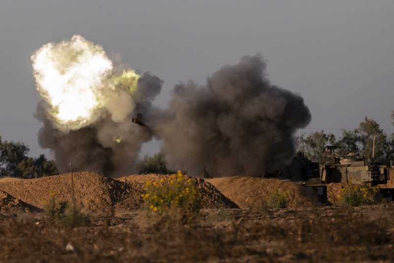 An Israeli155 self-propelled Howitzer fires from southern Israel into Rafah in the southern Gaza Strip on Tuesday. Israel entered the area and took over the Keren Shalom crossing during the night in what appears to be a "limited" ground offensive against Hamas. Photo by Jim Hollander/UPI