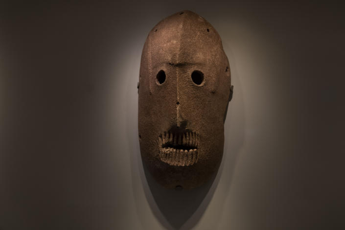 A Neolithic mask loaned by American billionaire Michael Steinhardt, is displayed at the Israel Museum in Jerusalem, Wednesday, Jan. 5, 2022. Last month, Steinhardt surrendered the artifact, along with 179 others valued at roughly $70 million, as part of a landmark deal with the Manhattan District Attorney's office to avoid prosecution. Eight Neolithic masks loaned by Steinhardt to the Israel Museum for a major exhibition in 2014 were also seized as part of the billionaire's deal with New York authorities. (AP Photo/Maya Alleruzzo)