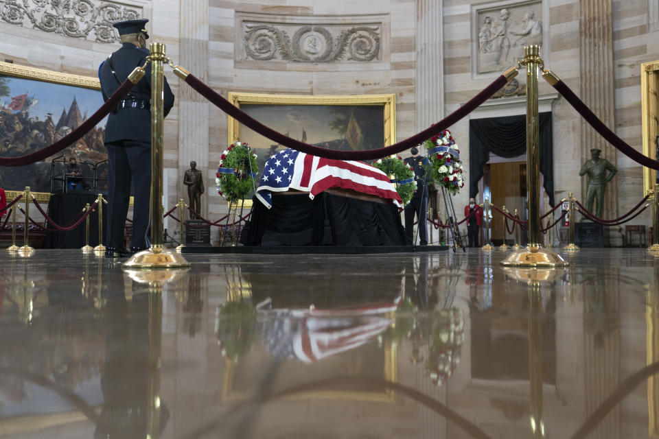 The flag-draped casket of former Senate Majority Leader Harry Reid of Nevada, lies in state in the Rotunda of the U.S Capitol, Wednesday, Jan. 12, 2022, in Washington. (AP Photo/Alex Brandon)