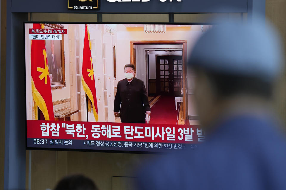 A man watches a TV screen showing a news program reporting about North Korea's missile launch with a file footage of North Korean leader Kim Jong Un, at a train station in Seoul, South Korea, Wednesday, May 25, 2022. North Korea launched three ballistic missiles toward the sea on Wednesday, its neighbors said, hours after President Joe Biden wrapped up his trip to Asia where he reaffirmed U.S. commitment to defend its allies in the face of the North's growing nuclear threat. (AP Photo/Lee Jin-man)