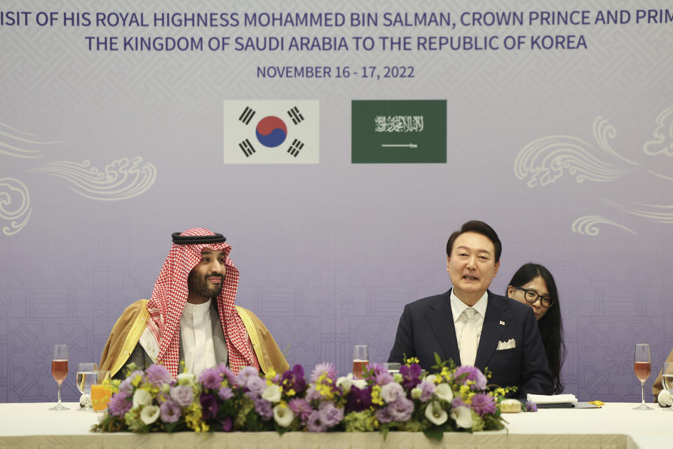 Saudi Arabian Crown Prince Mohammed bin Salman, left, talks with South Korean President Yoon Suk Yeol during a luncheon meeting at the presidential residence in Seoul, South Korea, Thursday, Nov. 17, 2022. (South Korean Presidential Office/Yonhap via AP)