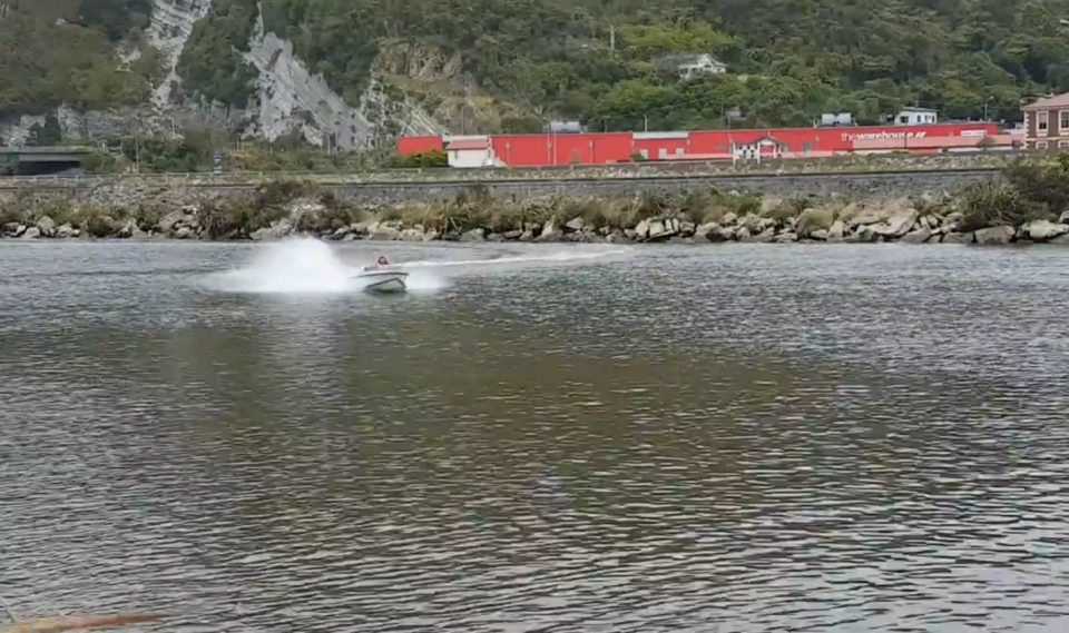 The video starts off calmly with a speedboat gliding along a river. Photo: Facebook