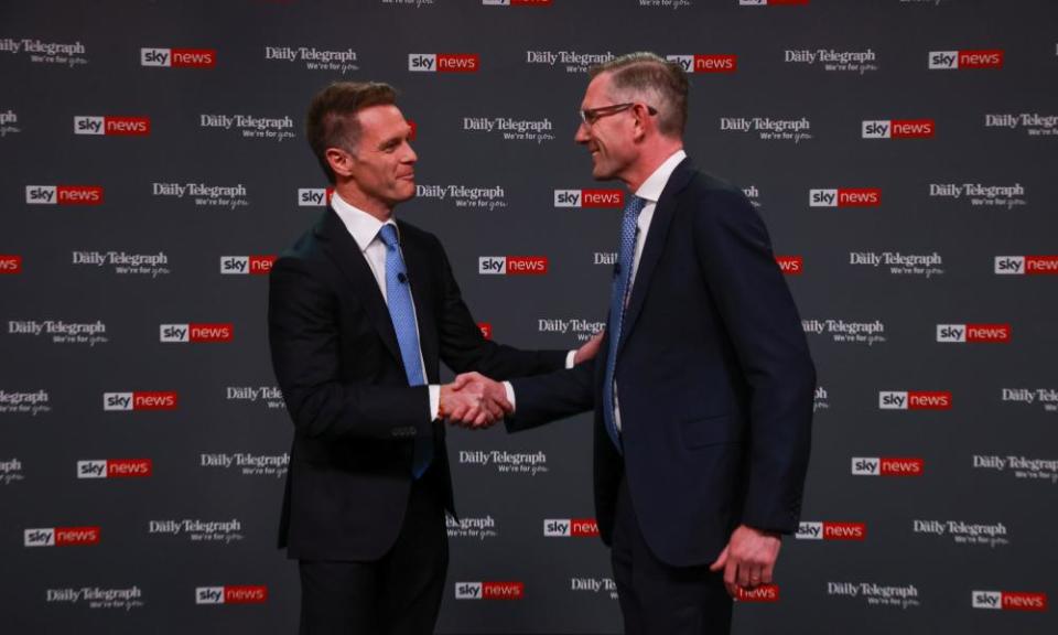 NSW Labor leader Chris Minns and NSW premier Dominic Perrottet shake hands during the final leaders debate.