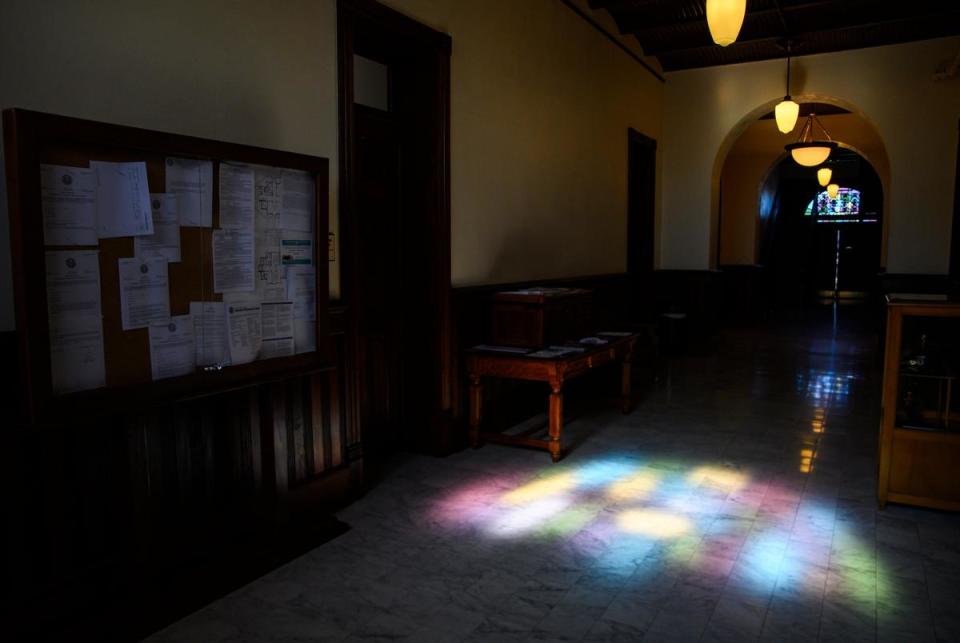 Light shines through one of the stained glass windows at the Karnes County Courthouse Thursday, Aug. 17, 2023 in Karnes City. The courthouse was initially built in 1894 after the county seat was moved from nearby Helena to Karnes City and the structure was renovated from 2011 to 2018.