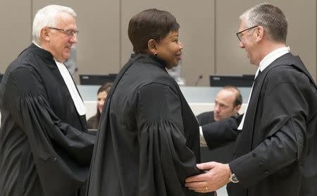 Senior Trial Lawyer, James Stewart (L), Chief Prosecutor Fatou Bensouda (C) and Peter Haynes, Lead Counsel for the defense are seen in a court room of the ICC before the delivery of the judgment in the case of Jean-Pierre Bemba Gombo, in the Hague, the Netherlands, March 21, 2016. REUTERS/Jerry Lampen/Pool