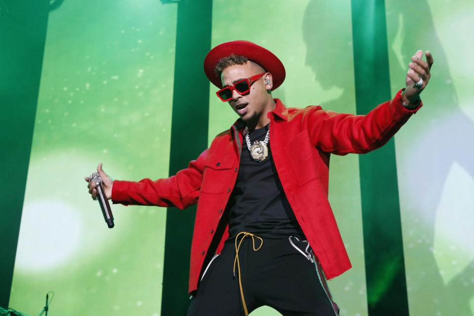 Singer Ozuna performs during the Coca Cola Flow Reggaeton festival in Mexico City, Saturday, Nov. 23, 2019. (AP Photo/Ginnette Riquelme)