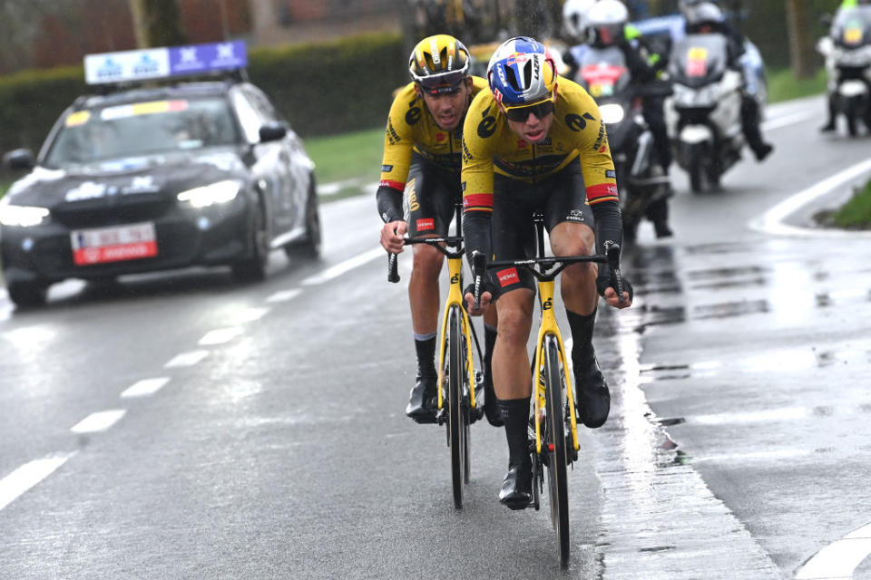 WEVELGEM BELGIUM  MARCH 26 LR Christophe Laporte of France and Wout Van Aert of Belgium and Team JumboVisma compete passing through a Kemmelberg cobblestones sector during the 85th GentWevelgem in Flanders Fields 2023 Mens Elite a 2609km one day race from Ypres to Wevelgem  UCIWT  on March 26 2023 in Wevelgem Belgium Photo by Tim de WaeleGetty Images