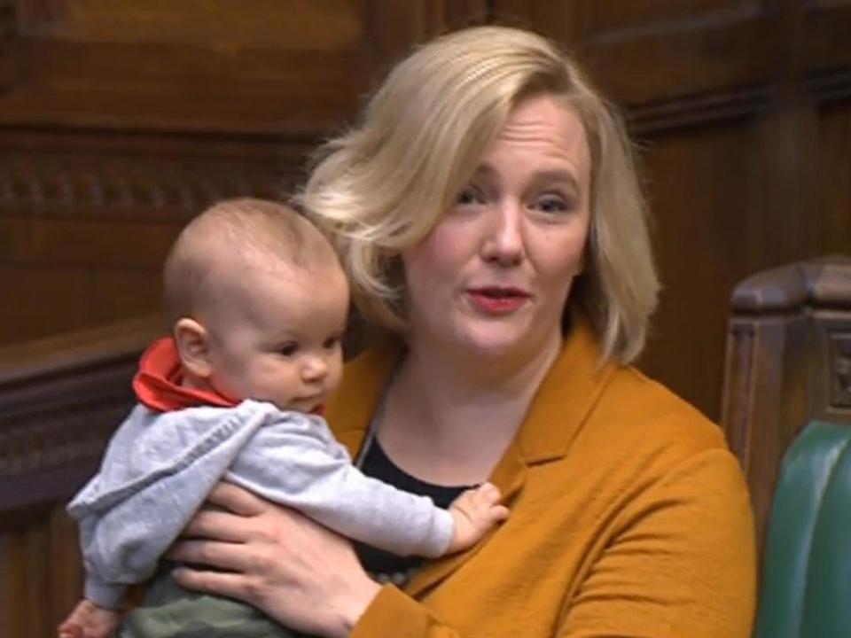 Stella Creasy holds her baby daughter in the House of Commons: House of Commons/PA