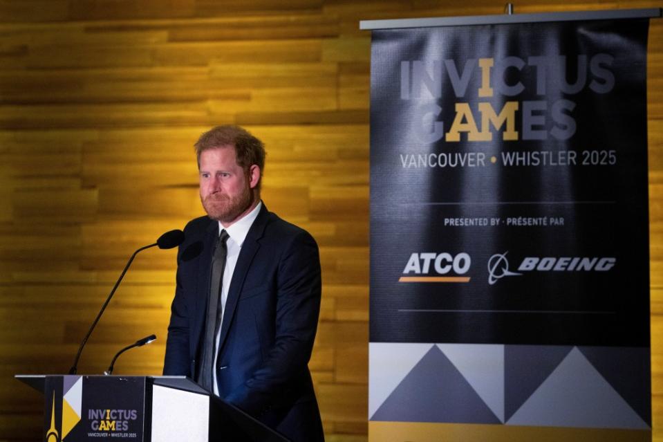 Prince Harry looks to the audience during his speech for the “One Year to Go” Invictus Games dinner in Vancouver on Feb. 16. AP