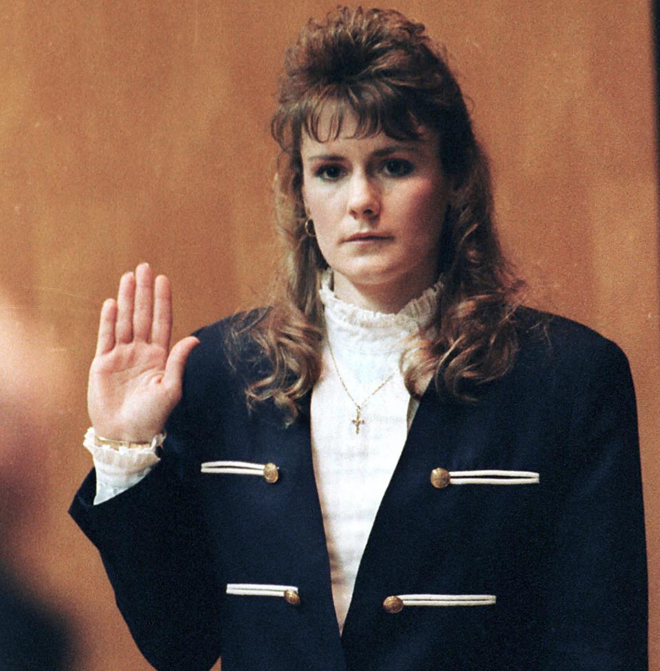 FILE - In this March 18, 1991 file photo, Pamela Smart, 23, takes the oath before sitting in the witness stand in Rockingham County Superior Court in Exeter, N.H. Even after 20 years, the New Hampshire school aide convicted of persuading her teenage lover to kill her husband insists she had nothing to do with plotting the death. Smart was a 22-year-old high school media coordinator and Flynn was 15 when he killed Gregg Smart at the couple's Derry, N.H., home. (AP Photo/Jon Pierre Lasseigne,File)