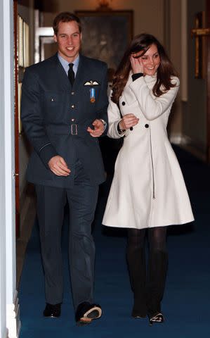 Pool/Anwar Hussein Collection/WireImage Prince William walks with his girlfriend Kate Middleton after his graduation ceremony at RAF Cranwell on April 11, 2008 in Cranwell, England