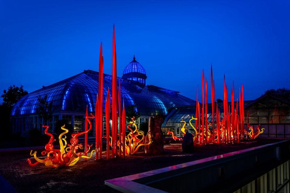 "Red Reeds" and "Sunset Sprays," among other Dale Chiluly glass works, are on display at the Franklin Park Conservatory and Botanical Gardens