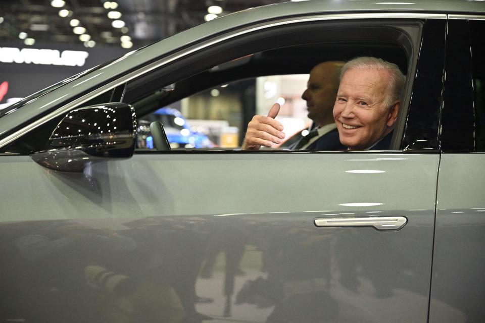US President Joe Biden sits at the wheel of a Cadillac Lyriq electric vehicle as he visits the 2022 North American International Auto Show in Detroit, Michigan, on September 14, 2022. (Photo by MANDEL NGAN / AFP) (Photo by MANDEL NGAN/AFP via Getty Images)