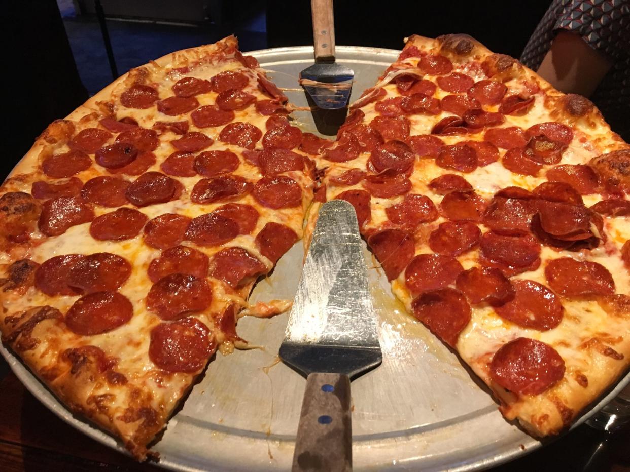 A huge pepperoni pizza