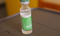 A vial of the ''Covishield'' coronavirus vaccine manufactured by the Serum Institute of India sits ready to be administered, at a hospital in the capital Victoria, Mahe Island, Seychelles Wednesday, Feb. 24, 2021. The president of the Indian Ocean island nation of Seychelles says he hopes enough residents will soon be vaccinated against COVID-19 to stop the spread of the virus, hoping to achieve herd immunity by mid-March by vaccinating about 70% of the population. (AP Photo)