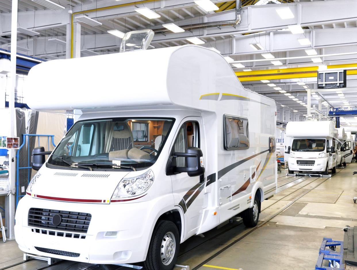 Berlin, Germany - June 08, 2012: quality control of finished assembly of motorhomes / camper vans in the production line in a factory