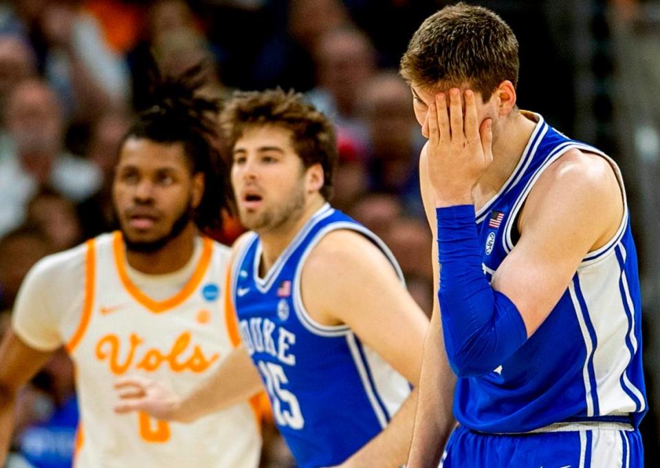 Duke’s Kyle Filipowski (30) reacts after being his in the eye in the first half against Tennessee during the second round of the NCAA Tournament on Saturday, March 18, 2023 at the Amway Center in Orlando, Fla
