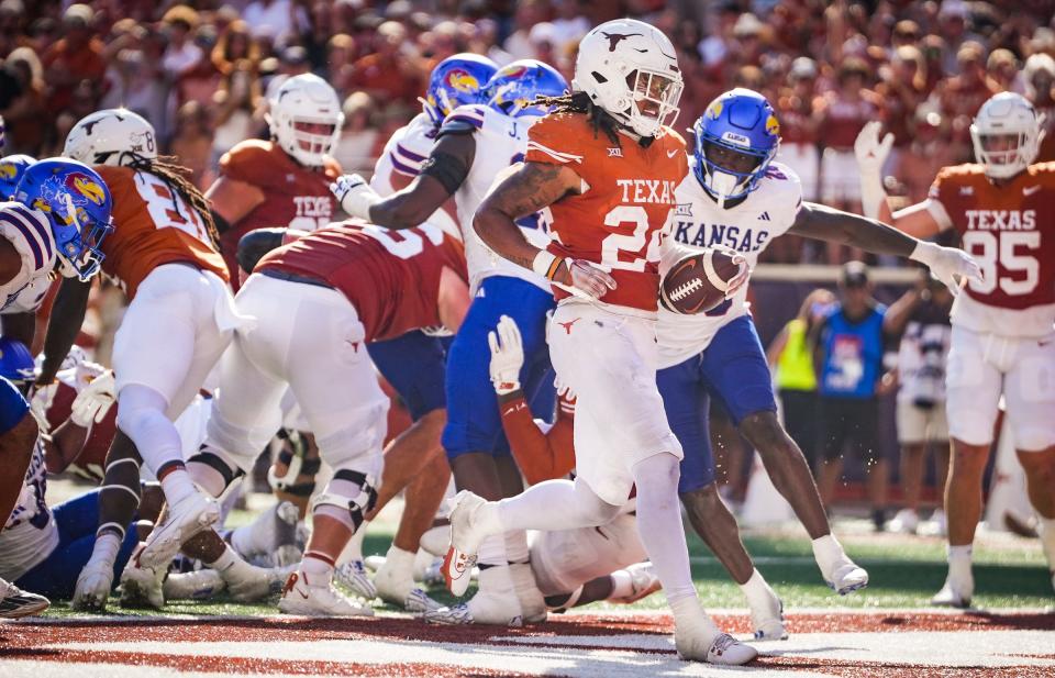 Texas running back Jonathon Brooks (24) carries the ball into the end zone for a touchdown in the third quarter of the Longhorns’ game against the Kansas Jayhawks, Saturday, Sept. 30 at Darrell K Royal-Texas Memorial Stadium in Austin. Texas won the game 40-14.