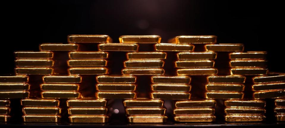 Gold bars are stacked at a safe deposit room of the ProAurum gold house in Munich on March 6, 2014. On April 17, 2023, 400 kilograms of gold were allegedly stolen during a headline-making theft that occurred at Toronto's Pearson airport. (Michael Dalder/Reuters - image credit)