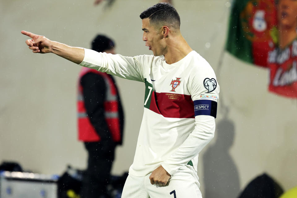 Portugal's Cristiano Ronaldo celebrates after scoring his sides fourth goal during the Euro 2024 group J qualifying soccer match between Luxembourg and Portugal at the Stade de Luxembourg in Luxembourg, Sunday, March 26, 2023. (AP Photo/Olivier Matthys)