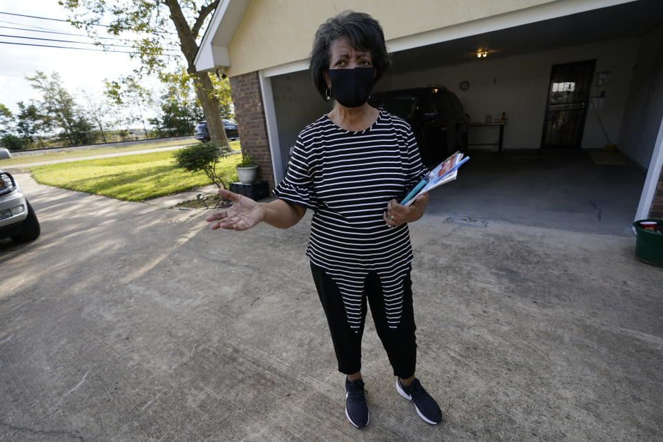 Former Itta Bena, Miss., Mayor Thelma Collins, who left office in 2017, tears up as she speaks about the growing debt of more than $800,000 owed by the city to its wholesale electrical provider, on Thursday, Oct. 22, 2020. Collins believes the city-run and owned utility's financial problems stem from a lack of vision and planning by the city administration. A long standing debt with the electrical provider warranted notice that they would completely disconnect the city on Dec. 1. (AP Photo/Rogelio V. Solis)