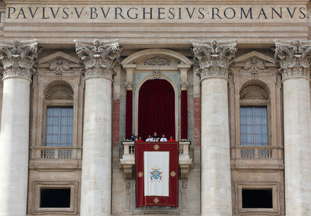 FILE PHOTO: Pope Francis delivers his "Urbi et Orbi" (to the city and the world) message from the balcony overlooking St. Peter's Square at the Vatican December 25, 2016. REUTERS/Alessandro Bianchi/File Photo