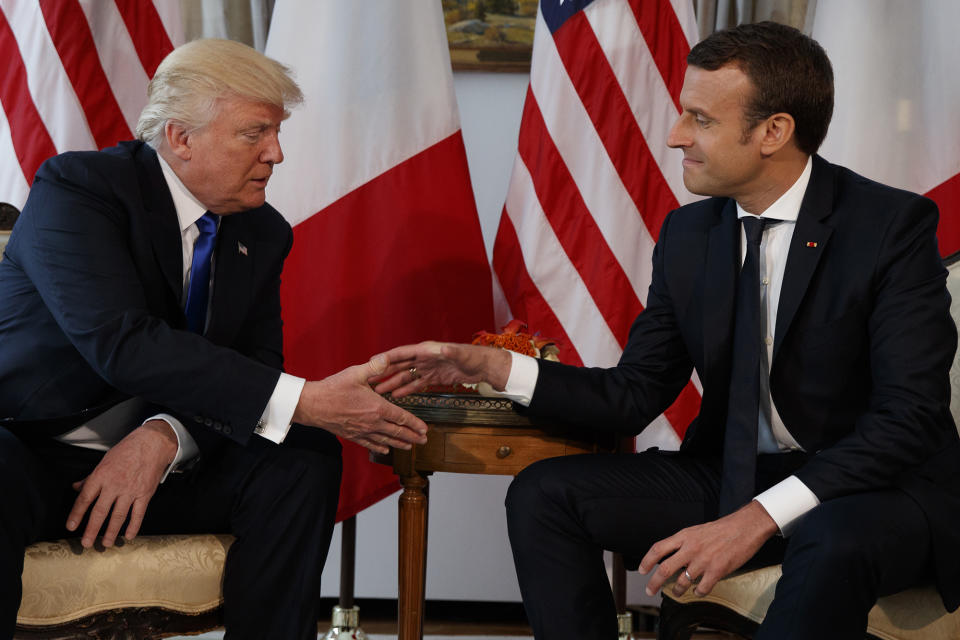 <p>President Donald Trump shakes hands with French President Emmanuel Macron during a meeting at the U.S. Embassy, Thursday, May 25, 2017, in Brussels. (Photo: Evan Vucci/AP) </p>