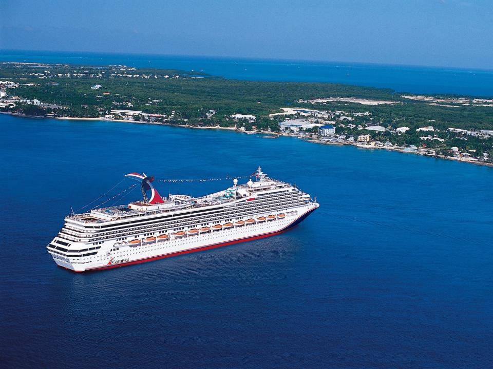 Carnival Conquest on water