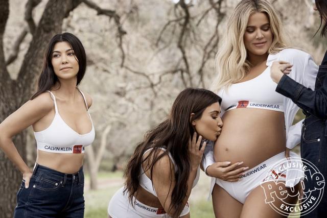Khloé Kardashian Models in Her Calvins (While 8 Months Pregnant) Alongside  Sisters