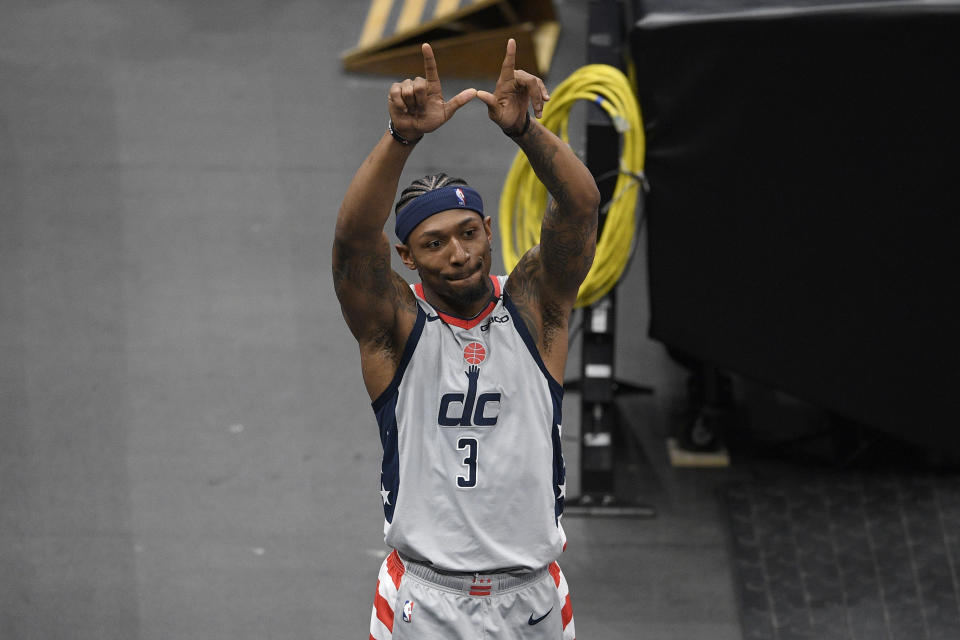 Washington Wizards guard Bradley Beal (3) gestures to the crowd after an NBA basketball game against the Charlotte Hornets, Sunday, May 16, 2021, in Washington. (AP Photo/Nick Wass)