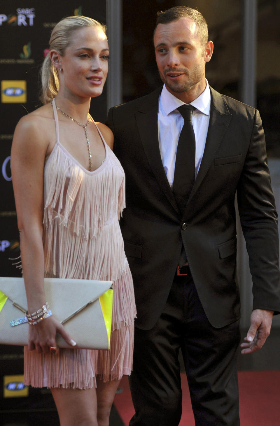 FILE This Nov. 4, 2012 photo shows Oscar Pistorius and girlfriend Reeva Steenkamp at an awards ceremony in Johannesburg, South Africa. Pistorius goes on trial Monday March 3, for the shooting death of Steenkamp. (AP Photo/City Press, Lucky Nxumalo) SOUTH AFRICA OUT