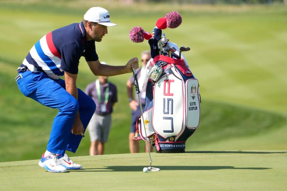 Scottie Scheffler looks at his putt on the 3rd green at Marco Simone during a practice round on Wednesday (AP)