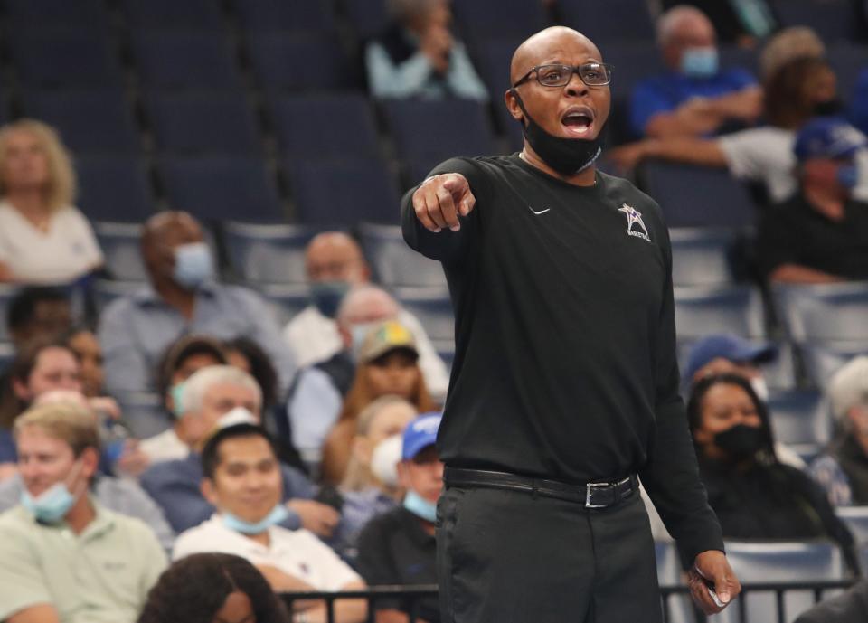 LeMoyne-Owen Magicians Head Coach Bonzi Wells yells out to his team as they take on the Memphis Tigers during their exhibition game at FedExForum Sunday, Oct. 24, 2021.