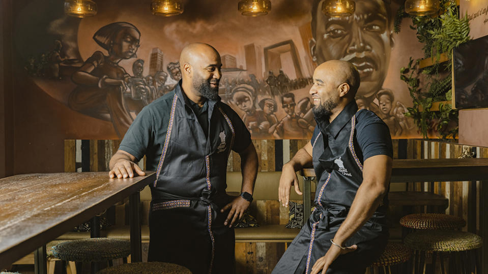 Joël Lainé (left), chef of the New Soul Food truck, and his brother Rudy Lainé, chef of the restaurant Le Maquis de New Soul Food, in Paris. - Credit: Laura Stevens