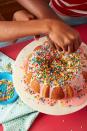 <p>No one can deny the allure of a good <a href="https://www.delish.com/cooking/recipe-ideas/a24788319/how-to-make-donuts-at-home/" rel="nofollow noopener" target="_blank" data-ylk="slk:glazed donut" class="link ">glazed donut</a>. Forget breaking out the heavy-bottomed pot and the fry oil—this easy bundt cake decorating idea checks ALL the same boxes. Thank us later!</p><p>Get the <strong><a href="https://www.delish.com/cooking/recipe-ideas/recipes/a47236/donut-cake-recipe/" rel="nofollow noopener" target="_blank" data-ylk="slk:Glazed Donut Cake recipe" class="link ">Glazed Donut Cake recipe</a></strong>.</p>