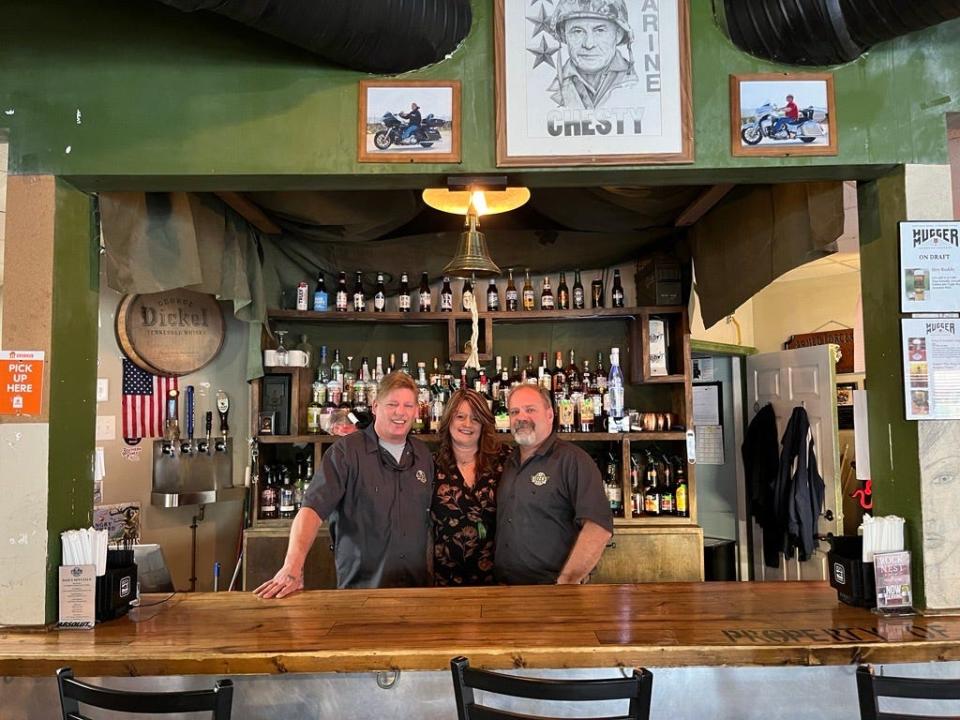 David Coleman, from left to right, Kimberly Coleman and Todd Harr, owners of 22 Klicks, 3109 N. Main St., Suite 110, Hope Mills.