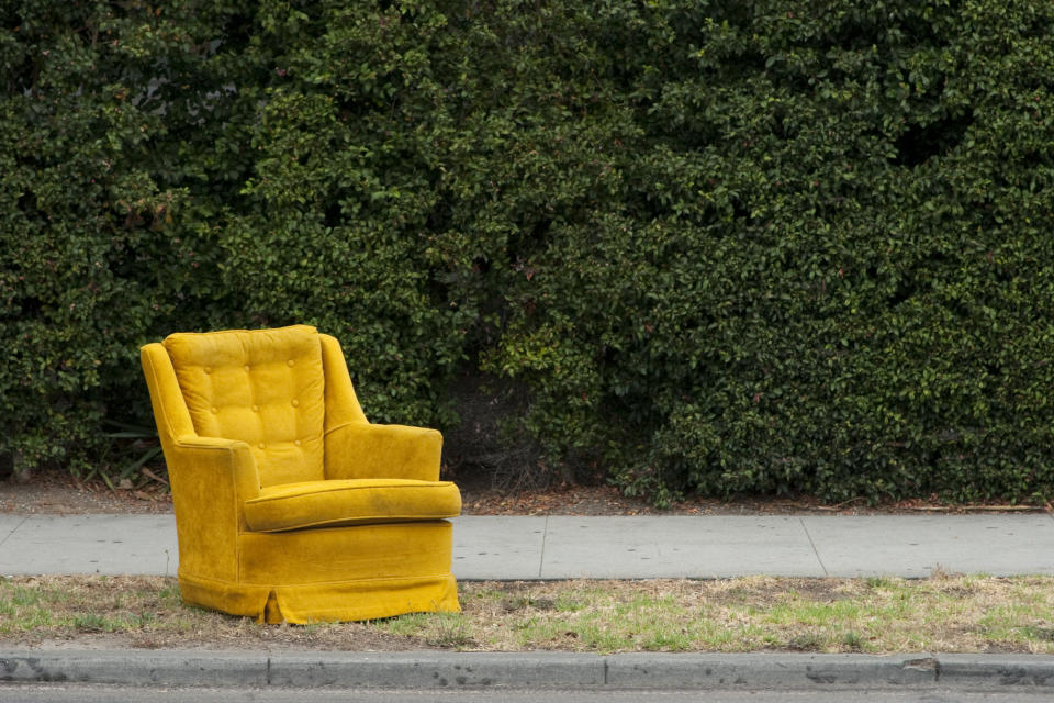 a chair on a sidewalk