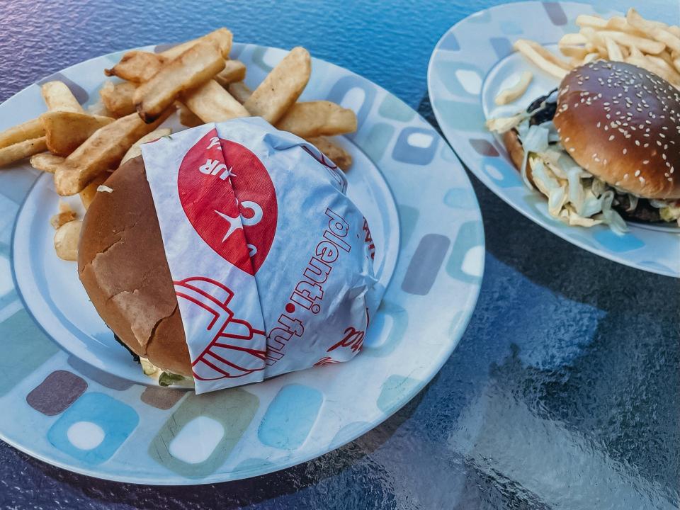 red robin cheeseburger meal next to a Mcdonalds cheeseburger meal