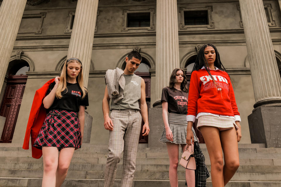 Models wearing Red Rooster merchandise