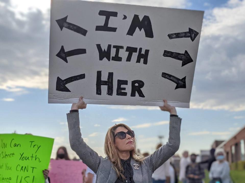 The demonstration was in support of a group of students who walked out of class earlier this week to protest gender-based discrimination. (Shane Hennessey/CBC - image credit)