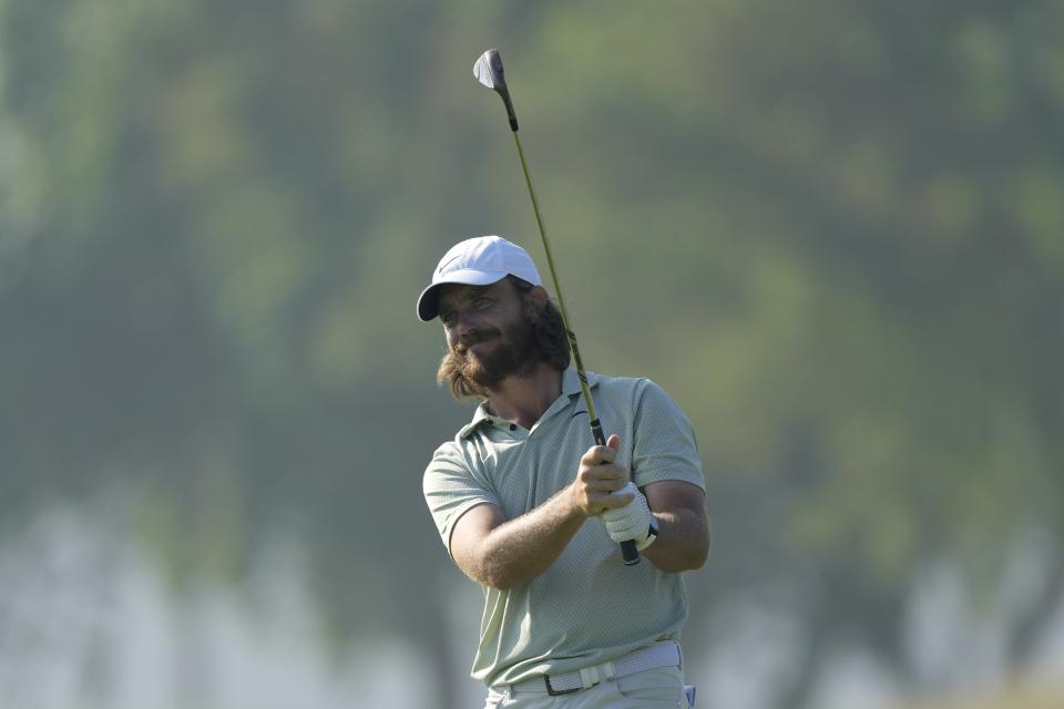 Tommy Fleetwood of England plays his second shot on the 11th hole during the second round of Dubai Invitational golf tournament, in Dubai, United Arab Emirates, Friday, Jan. 12, 2024. (AP Photo/Kamran Jebreili)